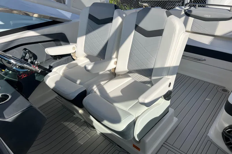  Yacht Photos Pics 2020 Chaparral 280 OSX boat interior with dual white captain seats.