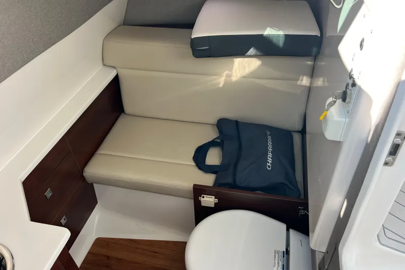  Yacht Photos Pics 2020 Chaparral 280 OSX cabin interior with seating and storage.
