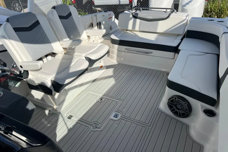  Yacht Photos Pics 2020 Chaparral 280 OSX boat interior with cushioned seating and modern design.