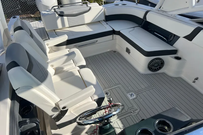  Yacht Photos Pics 2020 Chaparral 280 OSX boat interior with luxurious seating and modern design.