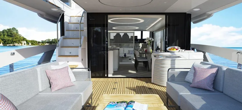 Absolute Navetta 70 Yacht Photos Pics Luxurious 2025 Absolute NAVETTA 70 yacht interior with modern seating and ocean view.