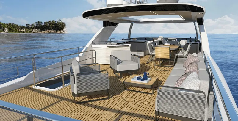 Absolute Navetta 70 Yacht Photos Pics Luxurious 2025 Absolute NAVETTA 70 yacht deck with modern seating and ocean view.