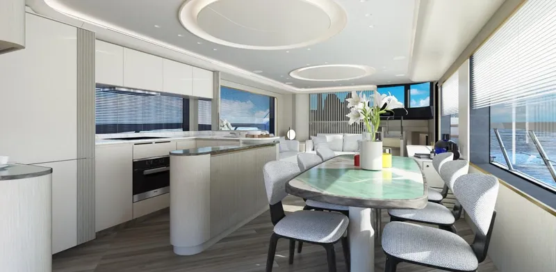 Absolute Navetta 70 Yacht Photos Pics Luxurious interior of 2025 Absolute NAVETTA 70 yacht with modern dining area and kitchen.