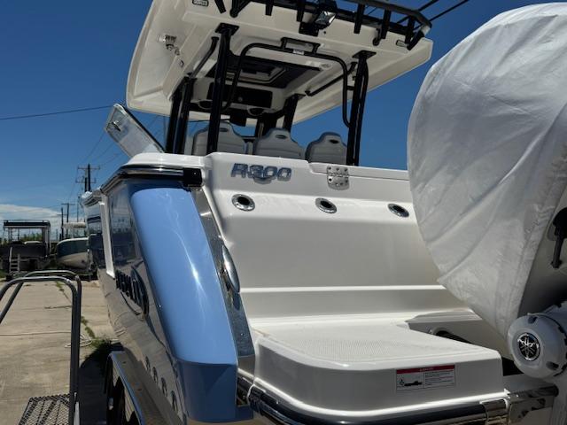 2025 Robalo R300 Center Console boat, rear view, showcasing sleek design and modern features.