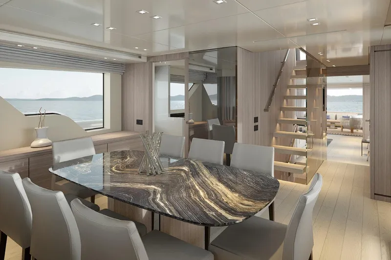 Sanlorenzo Sx88 Yacht Photos Pics Luxurious interior of 2025 Sanlorenzo SX88 yacht with elegant dining area and ocean view.