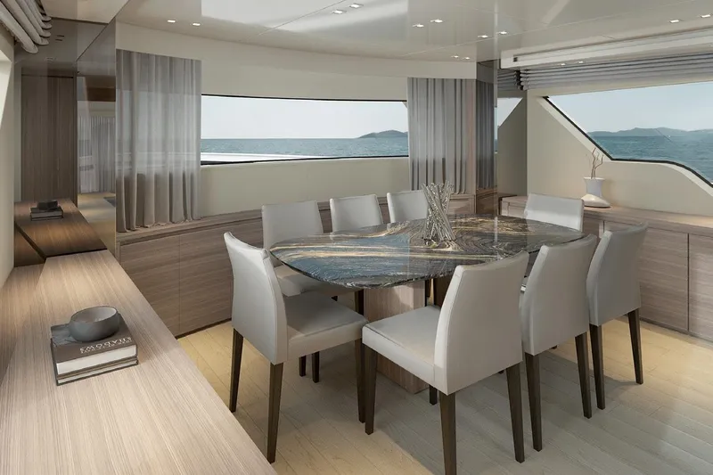 Sanlorenzo Sx88 Yacht Photos Pics Luxurious dining area on 2025 Sanlorenzo SX88 yacht with elegant marble table and ocean view.