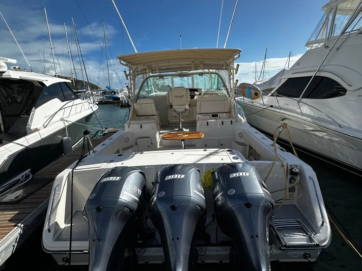  Yacht Photos Pics 2016 Grady-White Express 370 boat docked with triple outboard engines.