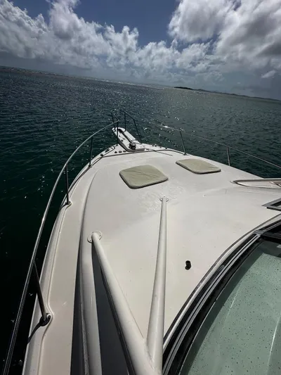  Yacht Photos Pics 2016 Grady-White Express 370 boat on open water under cloudy sky.