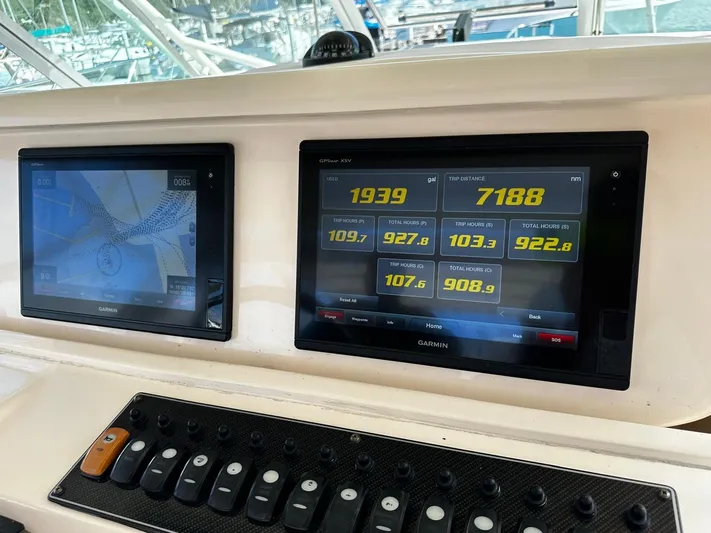  Yacht Photos Pics Dashboard of a 2016 Grady-White Express 370 with Garmin navigation displays.