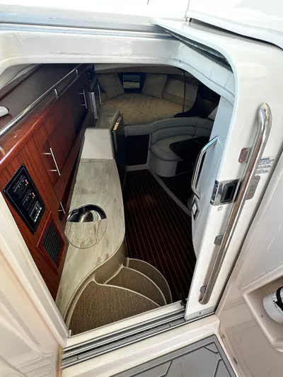  Yacht Photos Pics 2016 Grady-White Express 370 cabin interior with wood accents and modern amenities.