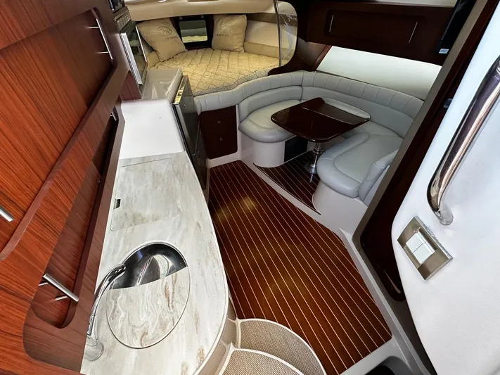  Yacht Photos Pics Luxurious interior of 2016 Grady-White Express 370 boat with modern amenities and elegant design.