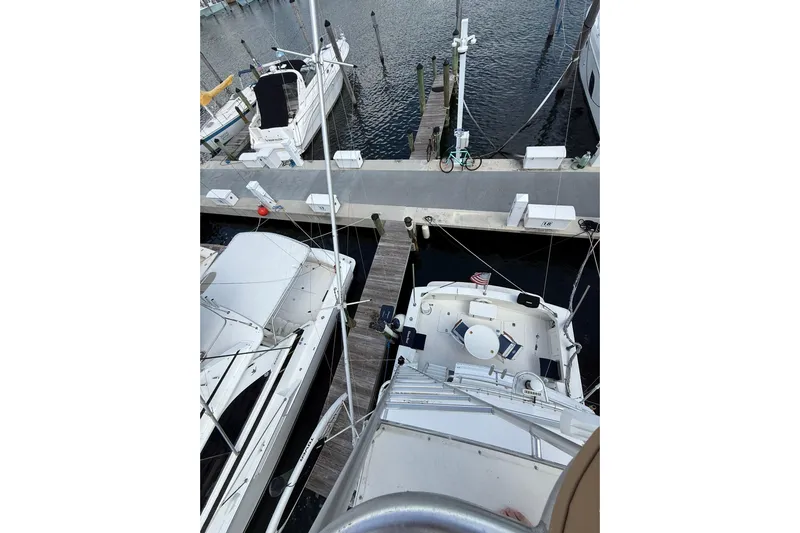  Yacht Photos Pics Overhead view of 1988 Bertram 43 Flybridge docked at marina.