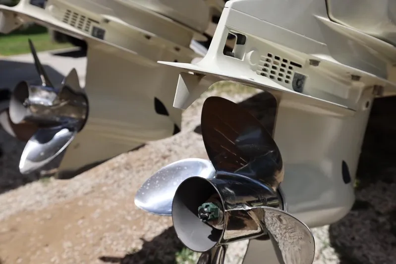 Late Fees Yacht Photos Pics Close-up of propellers on a 2001 Contender 27 Open boat.