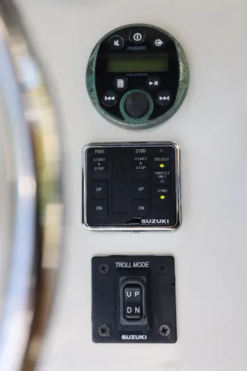 Late Fees Yacht Photos Pics Suzuki control panel on a 2001 Contender 27 Open boat.