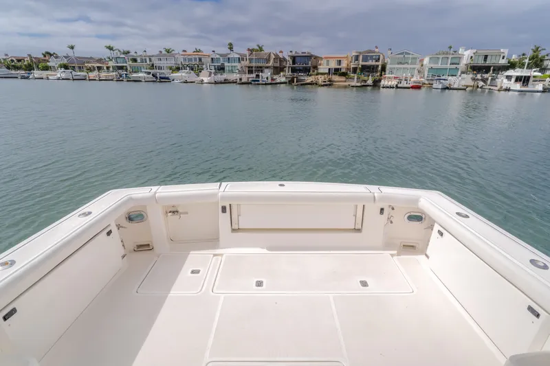 Half Dozen Yacht Photos Pics 2001 Tiara Yachts 4100 Open boat deck with waterfront view.