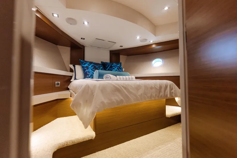  Yacht Photos Pics Luxurious bedroom interior of 2017 Hatteras M75 Panacera yacht with modern design.