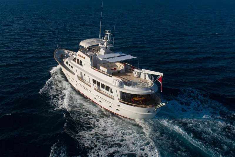  Yacht Photos Pics Moonen 85 yacht cruising on open sea, 1989 model, aerial view.