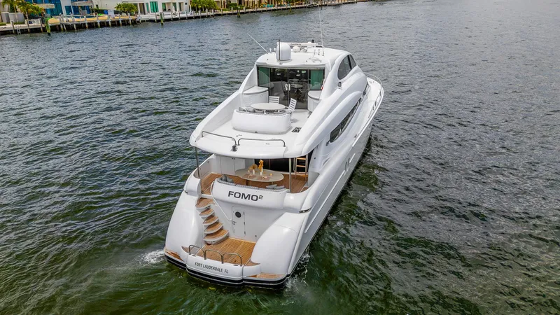 Fomo2 Yacht Photos Pics Luxury 2002 Lazzara 80 Skylounge yacht cruising in Fort Lauderdale waters.