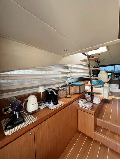  Yacht Photos Pics Interior of 2008 Ferretti Yachts 592 with modern amenities and wooden flooring.