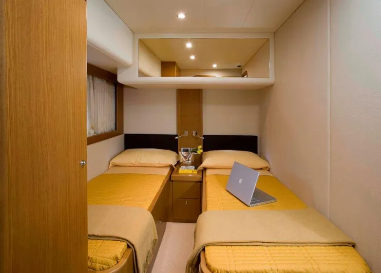  Yacht Photos Pics Luxurious twin cabin interior of 2008 Ferretti Yachts 592 with modern amenities.