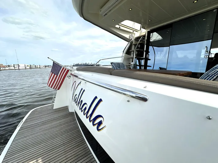  Yacht Photos Pics Luxury yacht "Valhalla" docked, featuring American flag, Prestige 500 model, 2013.