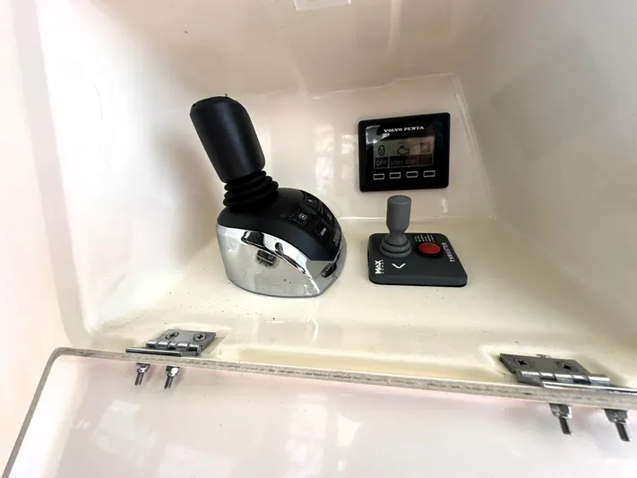  Yacht Photos Pics Control panel of a 2013 Prestige 500 yacht with joystick and display.