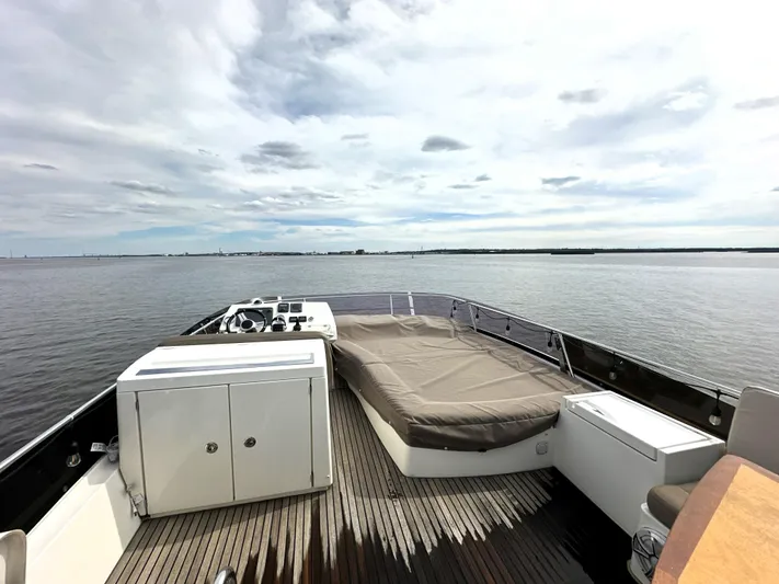  Yacht Photos Pics Prestige 500 yacht deck, 2013 model, featuring spacious seating and scenic water view.
