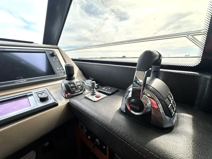  Yacht Photos Pics Control panel of a 2013 Prestige 500 yacht with navigation equipment.