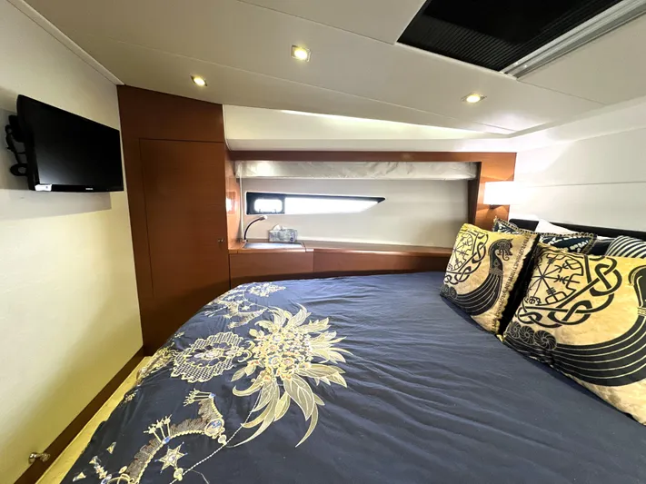  Yacht Photos Pics Luxurious bedroom interior of 2013 Prestige 500 yacht with elegant bedding and modern decor.