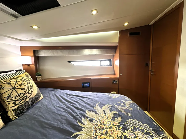  Yacht Photos Pics Luxurious cabin interior of 2013 Prestige 500 yacht with elegant bedding and modern lighting.