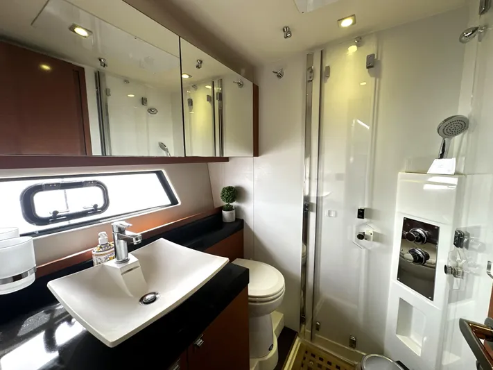  Yacht Photos Pics Luxurious bathroom in 2013 Prestige 500 yacht with modern fixtures and elegant design.
