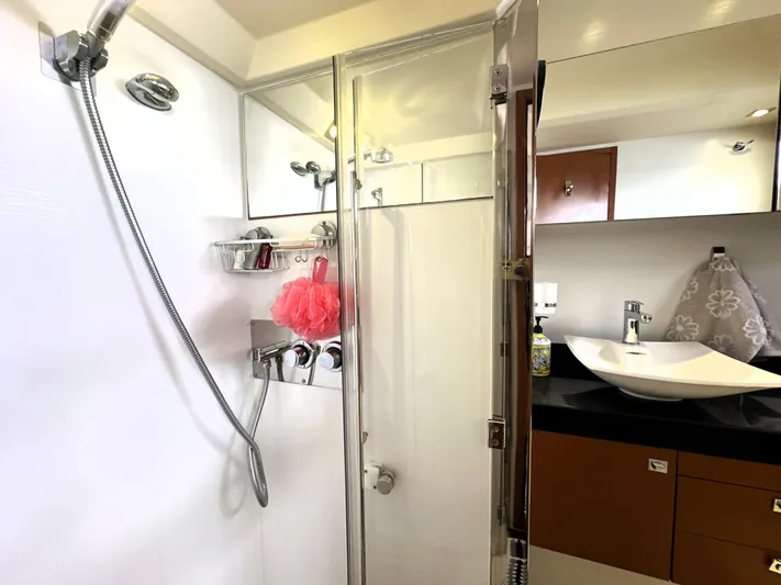  Yacht Photos Pics Luxurious bathroom in 2013 Prestige 500 yacht with modern fixtures and elegant design.