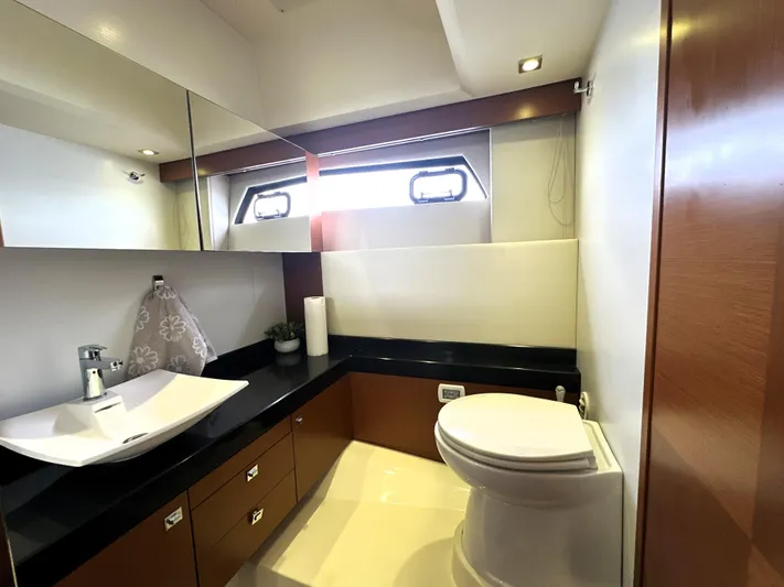  Yacht Photos Pics Luxurious bathroom in 2013 Prestige 500 yacht with modern fixtures and elegant design.