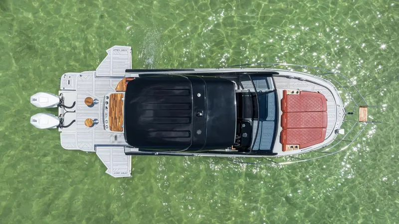  Yacht Photos Pics Aerial view of 2024 NHD 355 Open Deck boat on clear water.