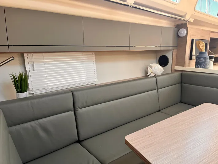 Sfo 418 #289 In Stock Yacht Photos Pics Modern interior of 2023 Hanse 418 yacht with sleek seating and cabinetry.