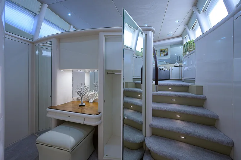 Grandeur Yacht Photos Pics Luxurious interior of 2005 DMB Danube Motor Yacht with elegant staircase and modern design.