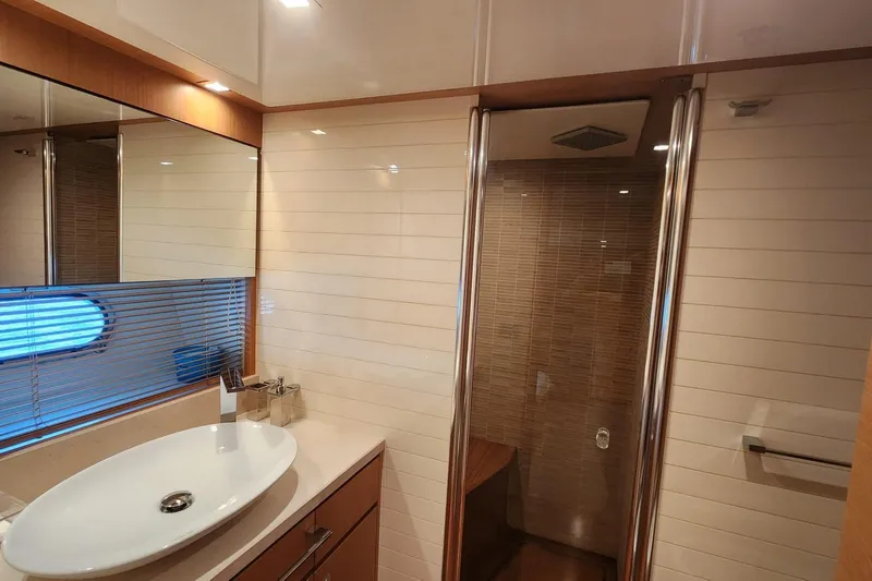  Yacht Photos Pics Luxurious bathroom in 2011 Custom Line Navetta 26 yacht with modern fixtures and elegant design.