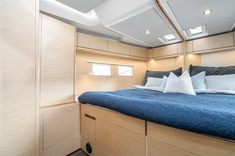  Yacht Photos Pics Luxurious 2019 Hanse 548 yacht cabin with modern design and cozy bedding.