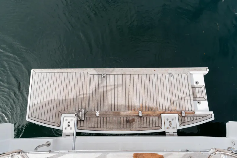  Yacht Photos Pics 2019 Hanse 548 yacht swim platform over calm water.