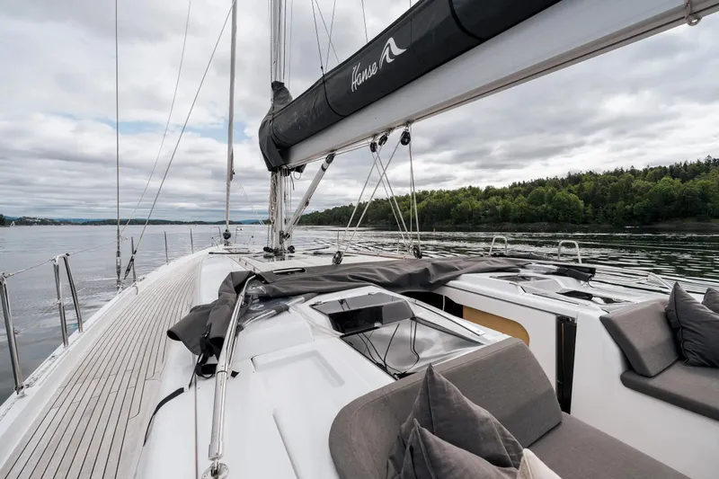  Yacht Photos Pics Luxurious 2019 Hanse 548 yacht deck with sleek design and comfortable seating.