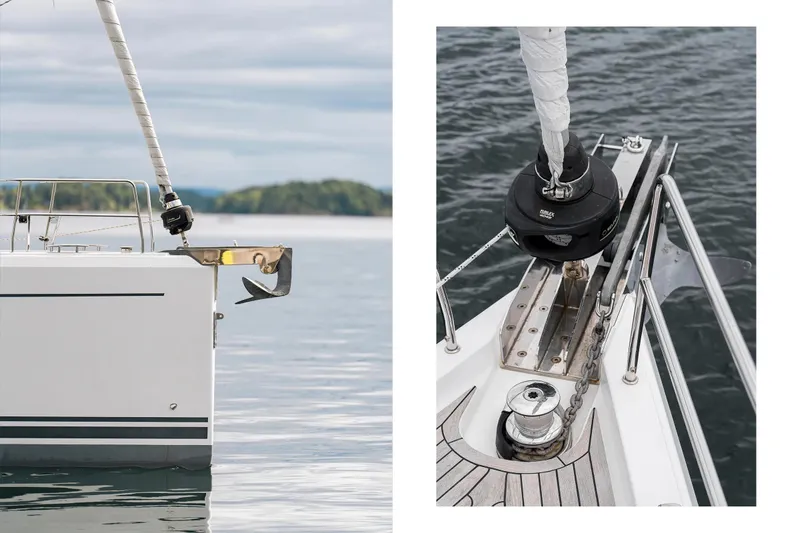  Yacht Photos Pics 2019 Hanse 548 yacht bow with anchor and deck details on calm water.