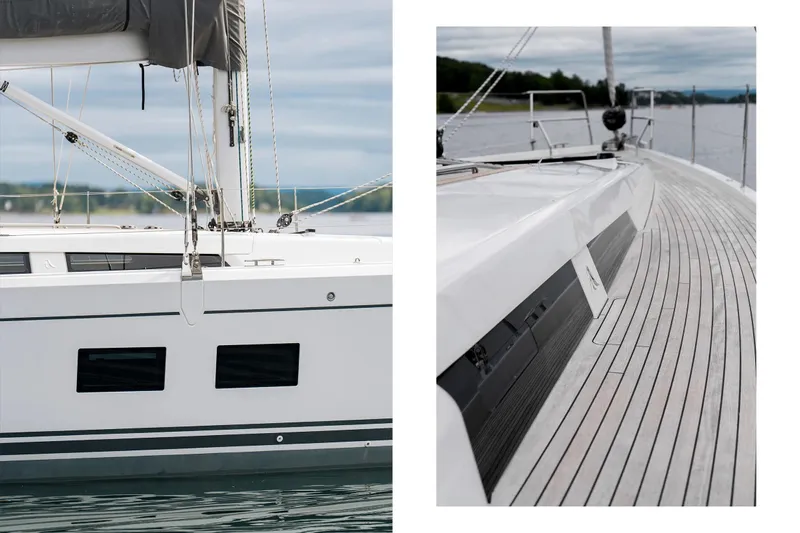  Yacht Photos Pics 2019 Hanse 548 sailboat, featuring sleek design and spacious deck, on calm waters.