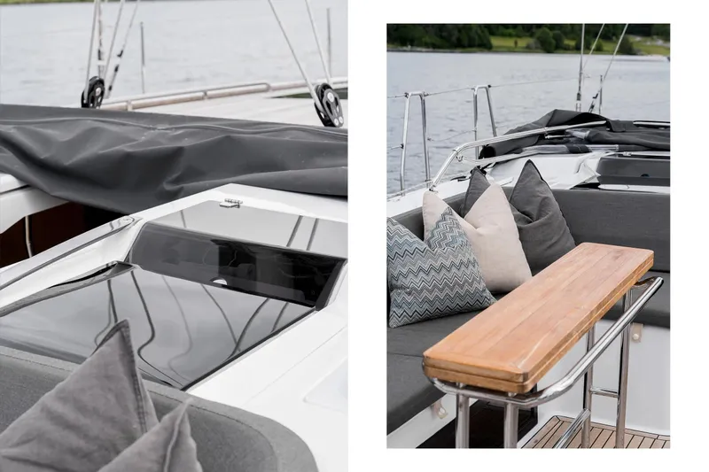  Yacht Photos Pics Luxurious 2019 Hanse 548 yacht interior with stylish cushions and sleek wooden table.