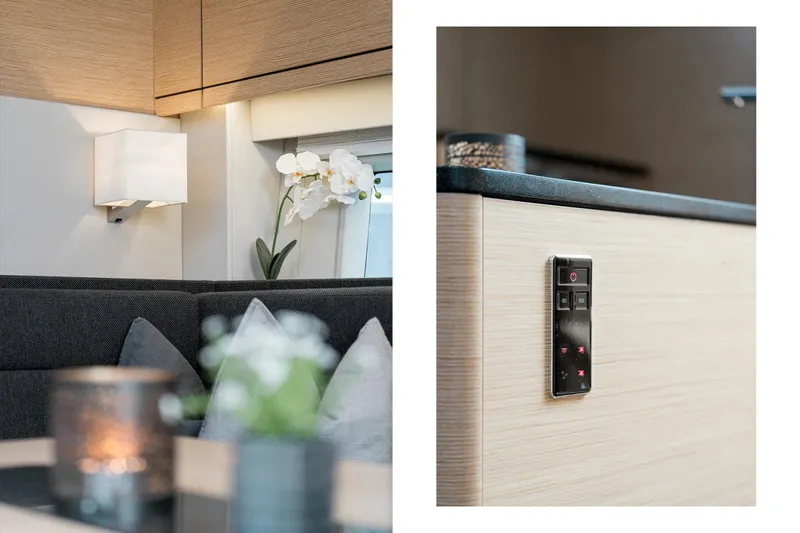  Yacht Photos Pics Luxurious interior of 2019 Hanse 548 yacht with modern lighting and sleek control panel.