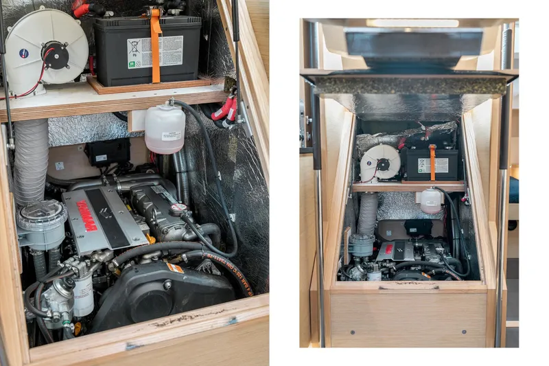  Yacht Photos Pics Engine compartment of a 2019 Hanse 548 yacht, showcasing battery and mechanical components.