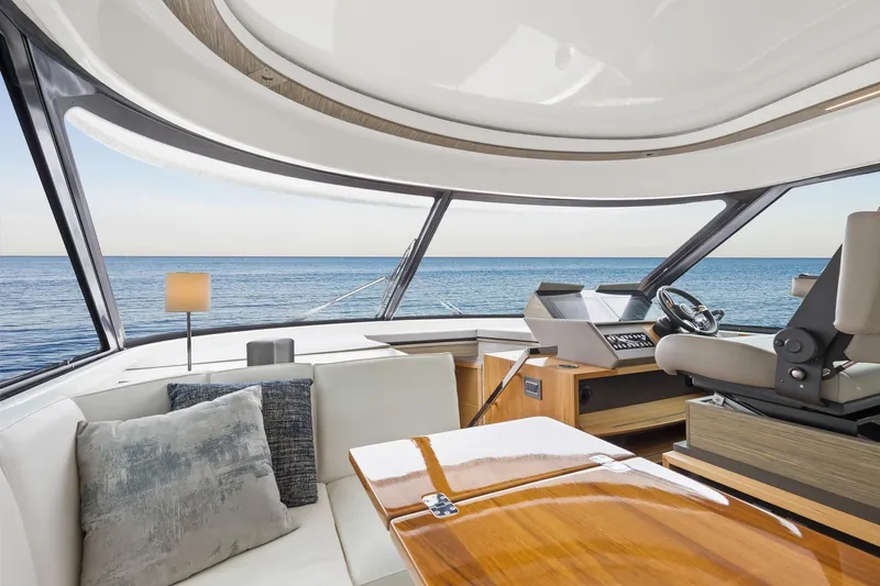 Segers Marine Yacht Photos Pics Luxurious interior of 2019 Tiara Yachts C49 Coupe with ocean view.