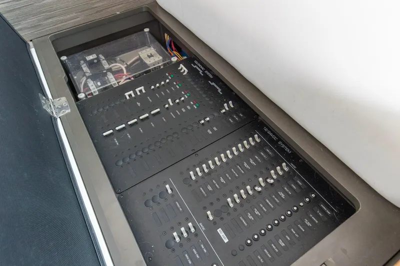 Segers Marine Yacht Photos Pics Electrical control panel on 2019 Tiara Yachts C49 Coupe, showcasing switches and wiring.