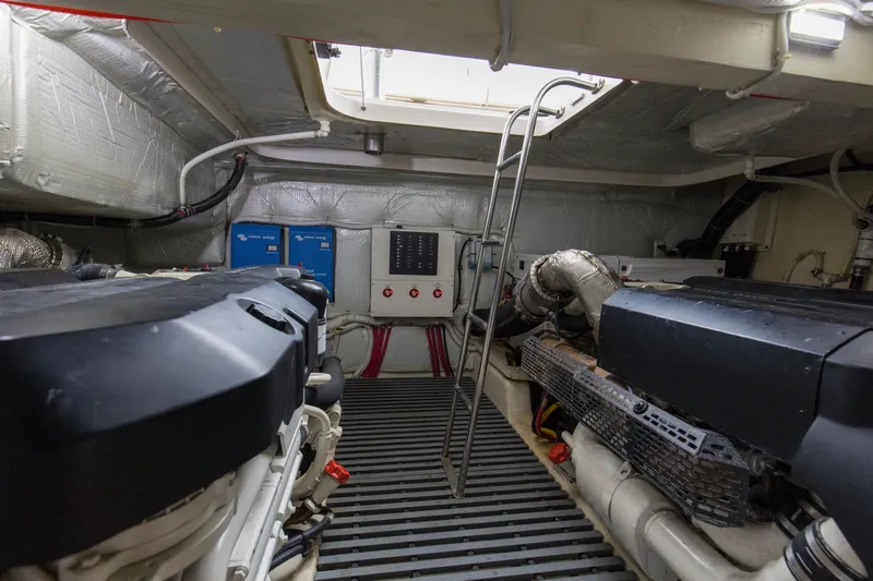 Segers Marine Yacht Photos Pics Engine room of 2019 Tiara Yachts C49 Coupe with dual engines and control panel.