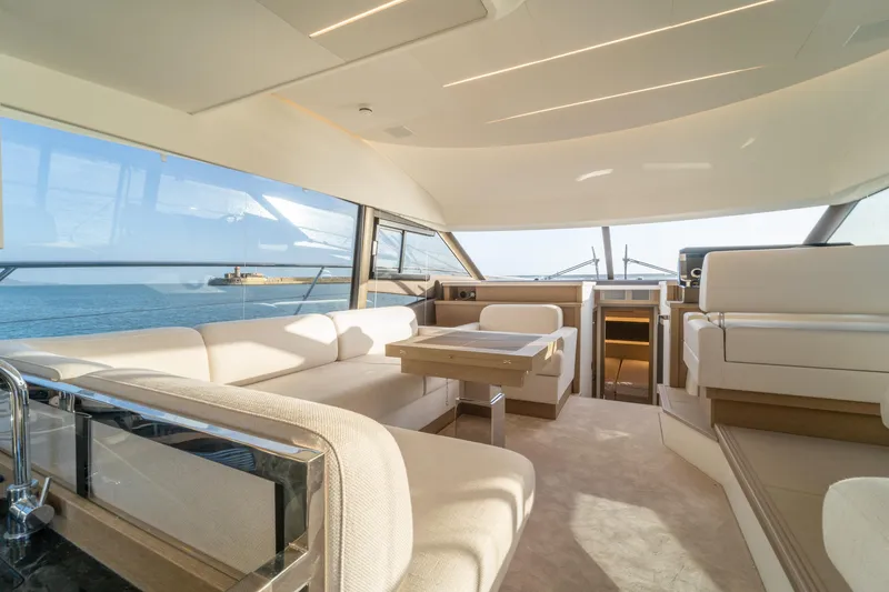  Yacht Photos Pics Luxurious interior of 2024 Prestige 520 yacht with panoramic ocean views.