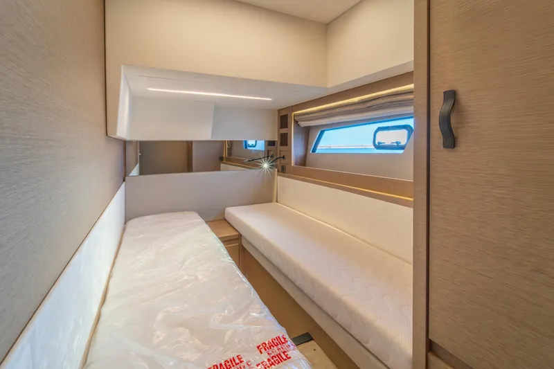  Yacht Photos Pics 2024 Prestige 520 yacht interior cabin with modern design and natural light.